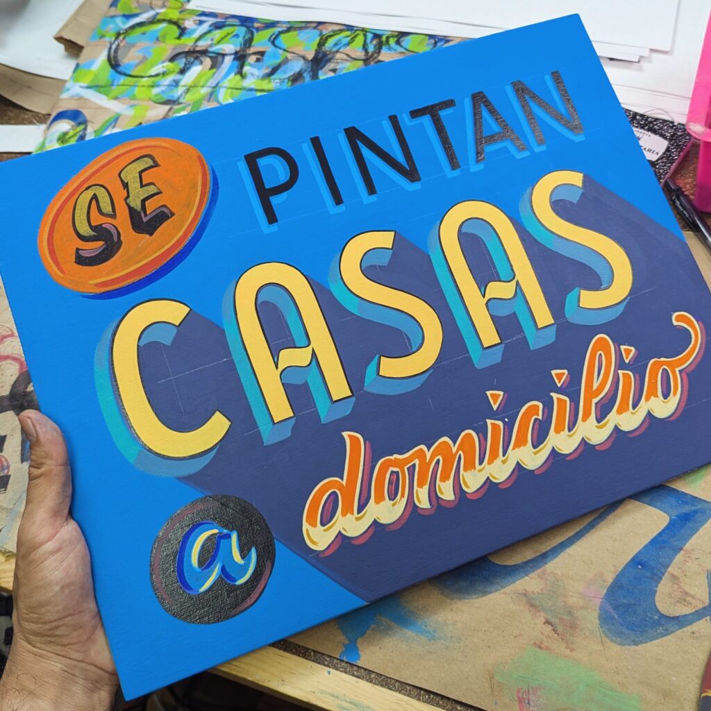 Letrero pintado a mano: Se pintan casas a domicilio